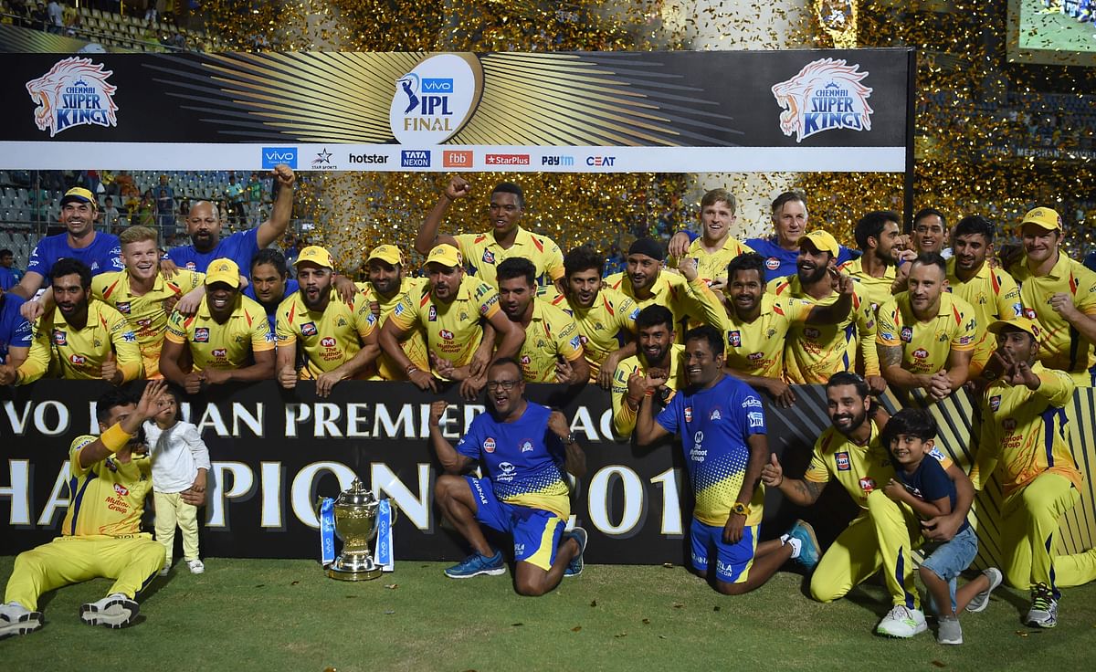 Chennai Super Kings players pose after winning the 2018 Indian Premier League (IPL) Twenty20 final cricket match between Chennai Super Kings and Sunrisers Hyderabad at the Wankhede stadium in Mumbai on May 27, 2018. Photo: AFP