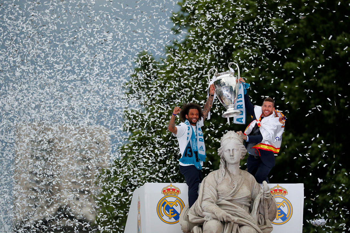 Real Madrid`s Sergio Ramos and Marcelo celebrate during victory in the Champions League Final in Madrid, Spain on 27 May. Photo: Reuters