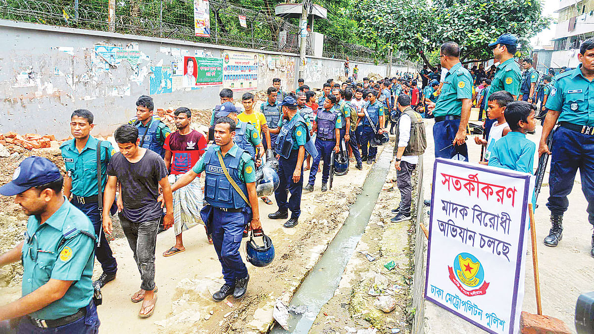 Police conduct an anti-drug drive in Dhaka’s Hazaribag area on Sunday.