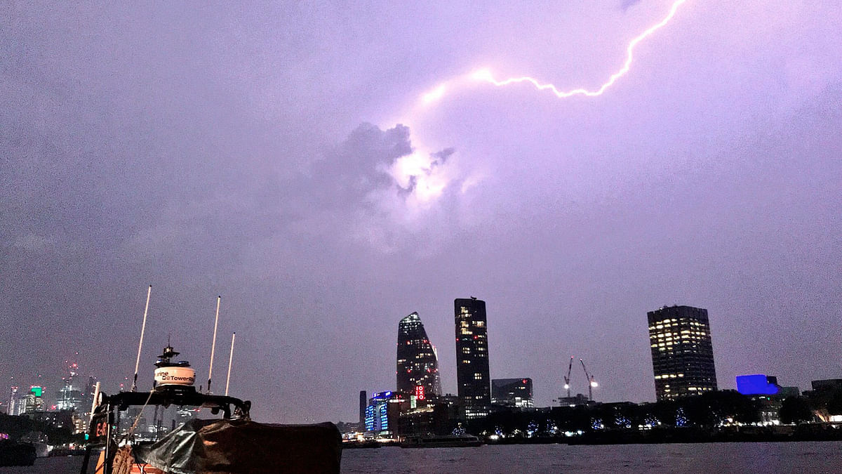 This photo shows a lightning strike during a storm in London, Saturday on 26 May 2018. Photo: AP