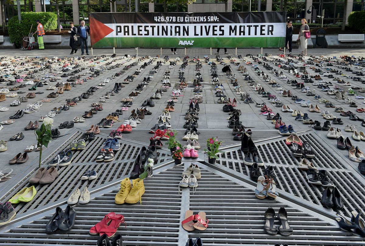 4500 shoes representing every life lost in the Israel-Palestine conflict since 2009 have been displayed ahead of the EU Foreign ministers meeting.  Photo: AFP