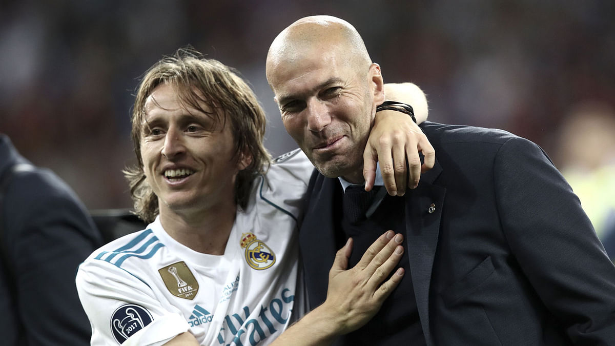 Modric, left, has won four Champions League titles with Real Madrid, three of which came with Zinedine Zidane as the coach.