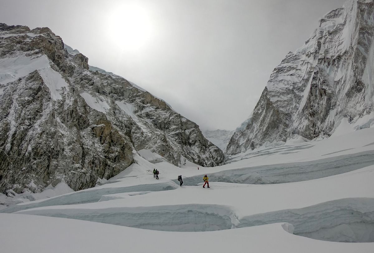In this photo taken on 29 April 2018, mountaineers walk near camp two of Mount Everest, as they prepare to ascend on the south face from Nepal.  Photo: AFP