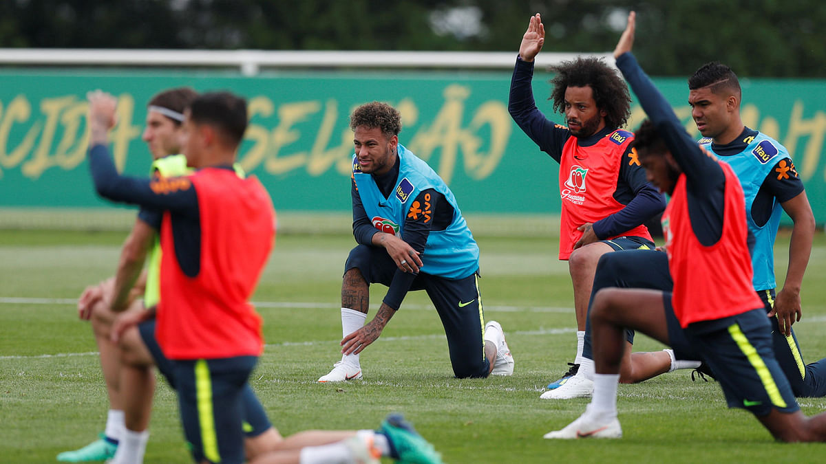 Brazil`s Neymar and Marcelo with team mates during training Action at Tottenham Hotspur Training Ground, London, on 30 May 2018. Photo: Reuters