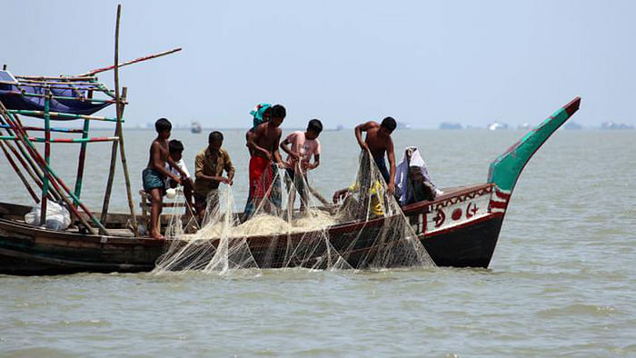 Fishermen cast their net for hilsa in Meghna river in Madanpur, Daulatkhan, Bhola. 