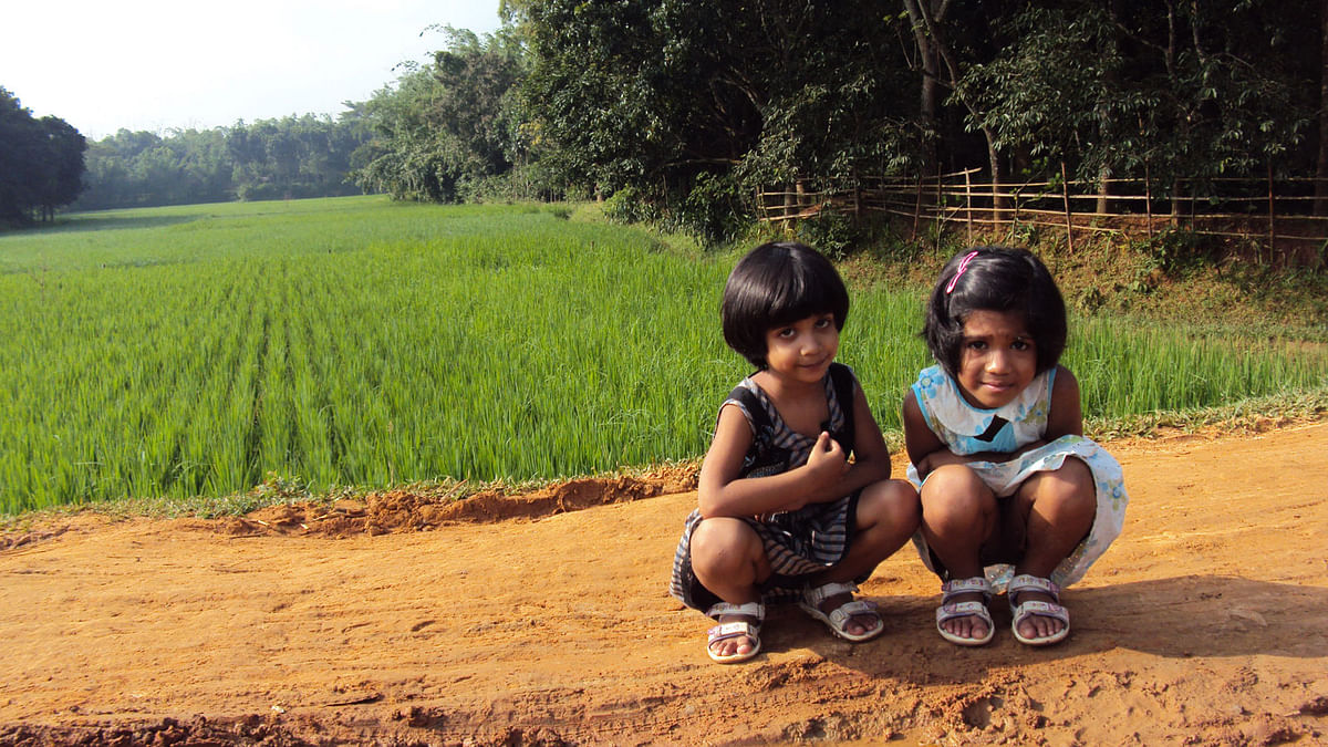 It`s a memory of a child who stays abroad, as two little girls are seen in front of a rice field