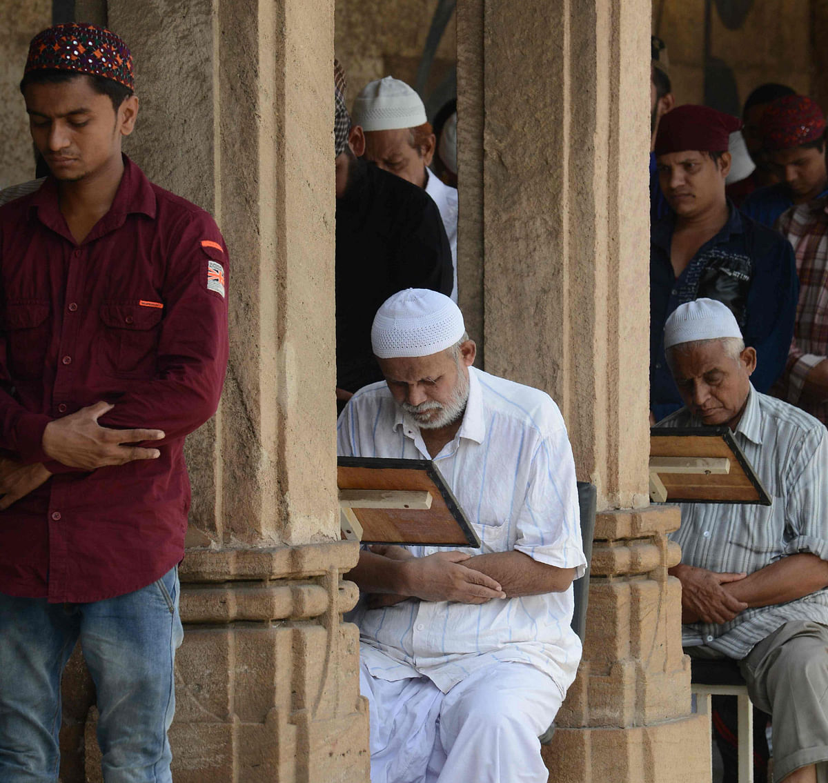 Indian Muslims offer Friday prayers during the Holy month of Ramadan at Shahi Jama Masjid in Ahmedabad on 1 June 2018. Photo: AFP