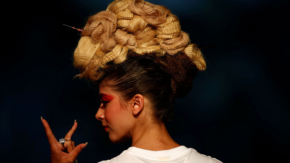 A model presents a hairstyle creation by stylist Flavia Borg Attard during the Malta Fashion Awards, the climax of Malta Fashion Week, in Valletta, Malta on 2 June. Photo: Reuters