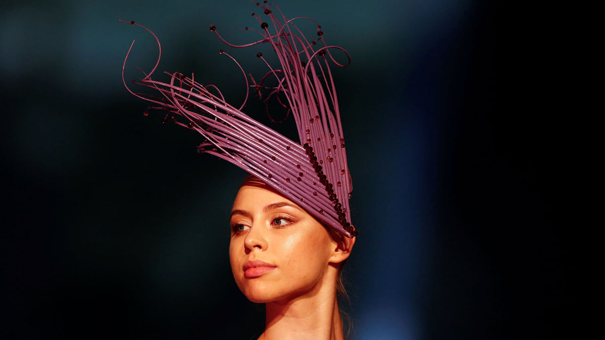 A model presents a headpiece creation by designer Adalia during the Malta Fashion Awards, the climax of Malta Fashion Week, in Valletta, Malta on 2 June 2018. Photo: Reuters