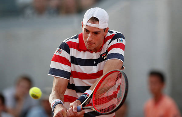 Roland Garros, Paris, France - 2 June 2018 John Isner of the US in action during his third round match against France`s Pierre-Hugues Herbert. Photo: Reuters