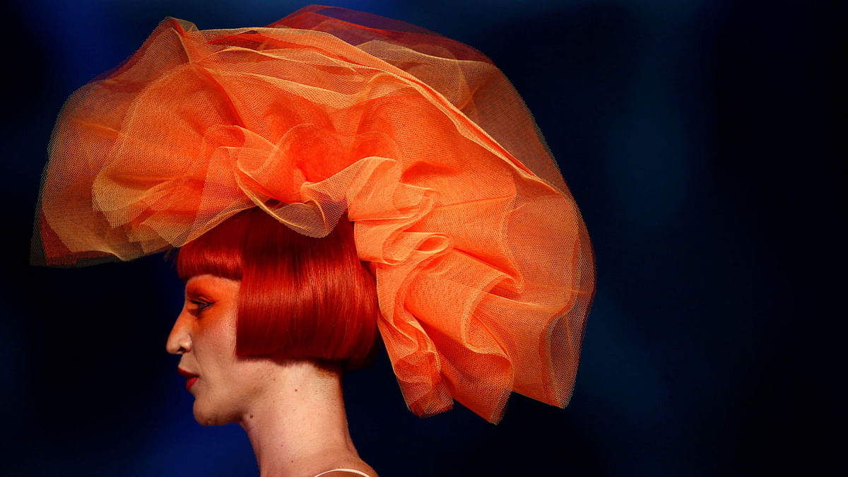 A model presents a hairstyle creation by stylist Neville Roman Zammit during the Malta Fashion Awards, the climax of Malta Fashion Week, in Valletta, Malta on 2 June. Photo: Reuters