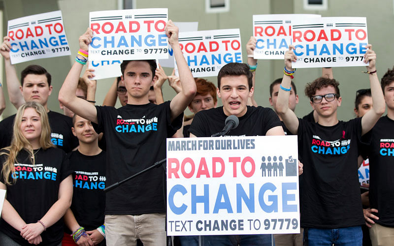 Cameron Kasky, centre, speaks during a news conference, Monday, 4 June 2018, in Parkland, Florida, US. Photo: US