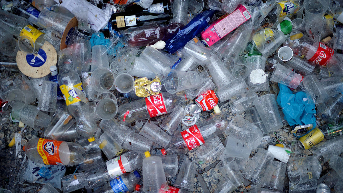 Plastic and glass waste lies on the ground during the Tamborrada in the Basque coastal town of San Sebastian. Photo: Reuters