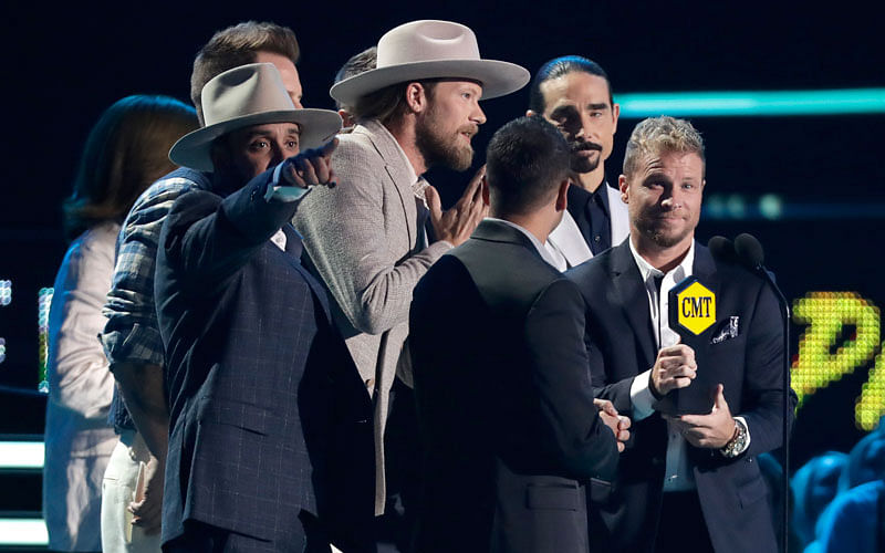 Musical groups Backstreet Boys and Florida Georgia Line accept the CMT performance of the year award at the CMT Music Awards at the Bridgestone Arena on Wednesday, 6 June 2018, in Nashville, Tennessee, US. Photo: AP