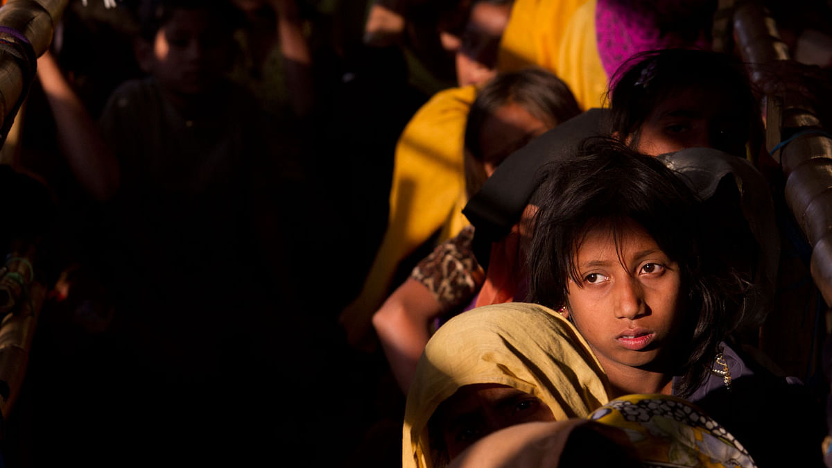 In this 27 January 2018, file photo, Rohingya refugees wait in a queue to receive relief material at the Balukhali refugee camp near Cox`s Bazar, Bangladesh. Photo: AP