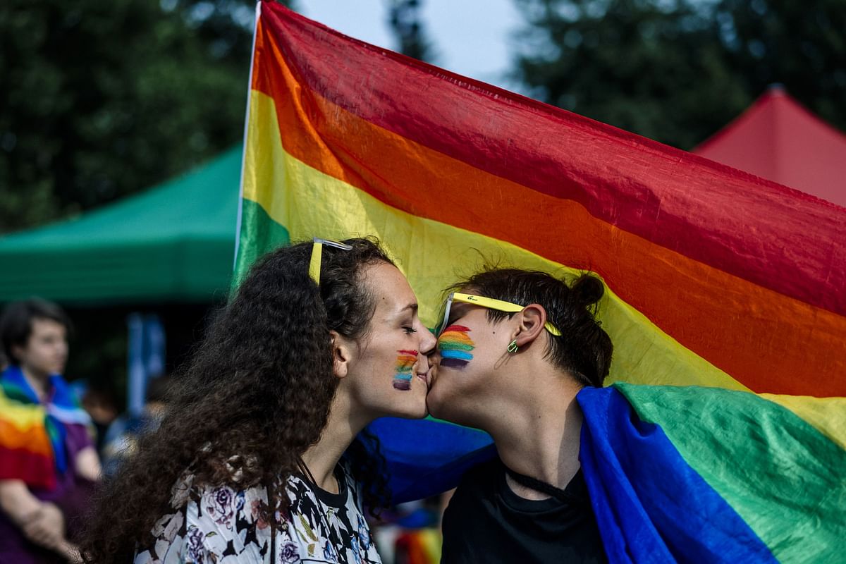 A couple kisses during the 11th Gay Pride Parade in downtown Sofia on 9 June, as gays, lesbians and transsexuals march through Bulgarian capital to protest against discrimination against homosexuals and improve their integration in the society. Photo: AFP