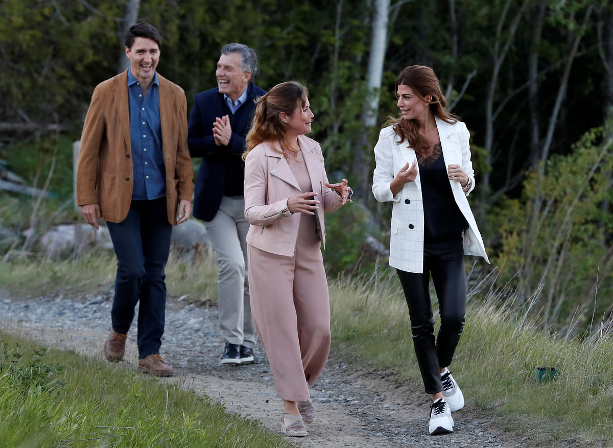 Canada`s prime minister Justin Trudeau and his wife Sophie Gregoire Trudeau walk with Argentina`s president Mauricio Macri and his wife Juliana Awada Macri during a G7 Summit in the Charlevoix town of La Malbaie, Quebec, Canada on 9 June. Photo: Reuters