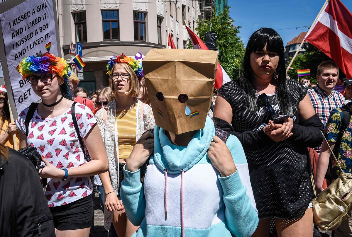 Protesters take part in the Baltic gay pride parade in Riga, on 9 June. LGBT groups from Estonia, Latvia and Lithuania gather for the Baltic Pride parade 2018. Photo: AFP
