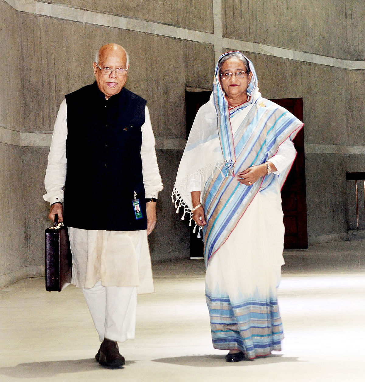 Prime minister Sheikh Hasina (R) and finance minister Abul Maal Abdul Muhith just before the budget session in Parliament on 7 June. Photo: PID