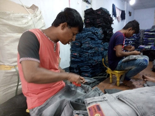Busy workers at their factory in Keraniganj. Photo : Mushfique Wadud