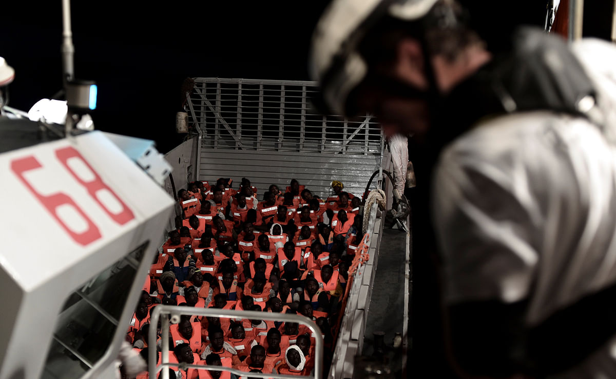 Migrants are rescued by staff members of the MV Aquarius, a search and rescue ship run in partnership between SOS Mediterranee and Medecins Sans Frontieres in the central Mediterranean Sea on 10 June 2018. Photo: Reuters