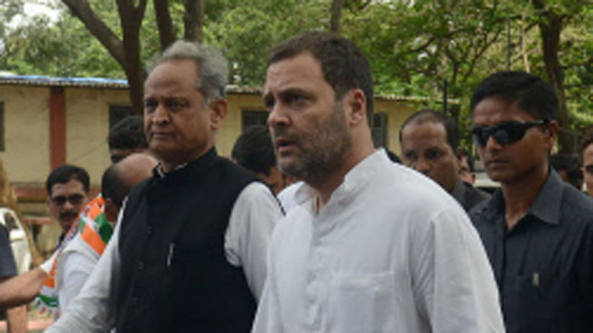 India`s Congress leader Rahul Gandhi (C) speaks to the media as he leaves after appearing in a criminal defamation case filed against him for his alleged remarks against the RSS at a magistrate court in Bhiwandi on 12 June, 2018