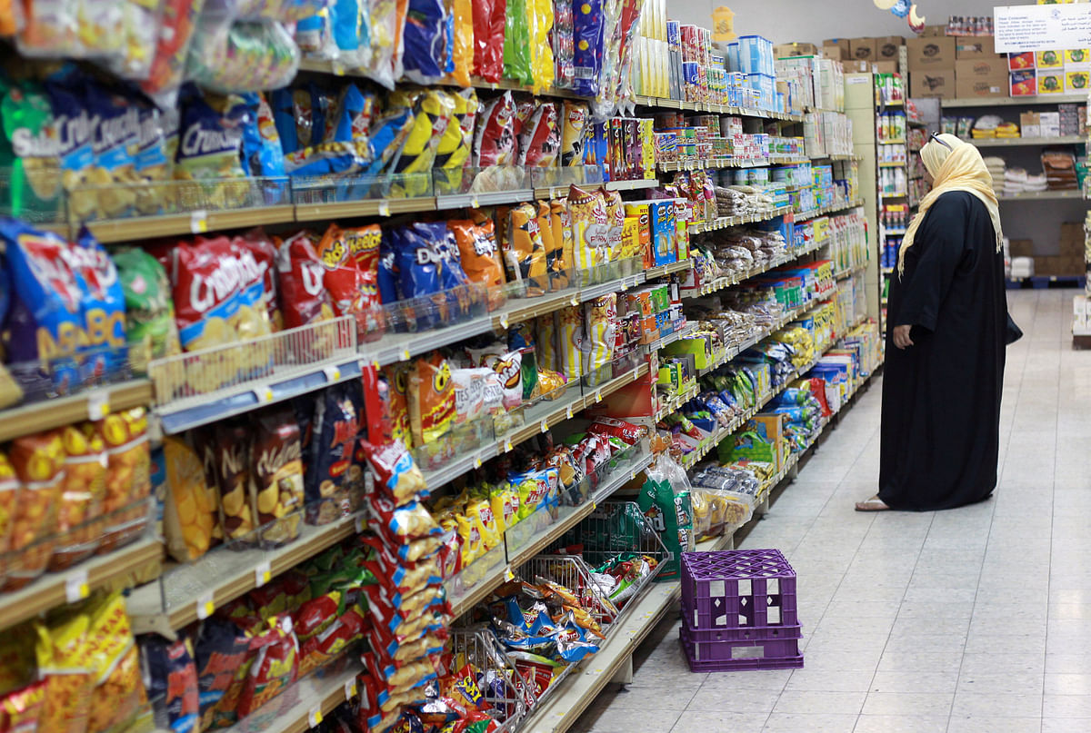 Woman shops in a supermarket in Doha. Photo: Reuters