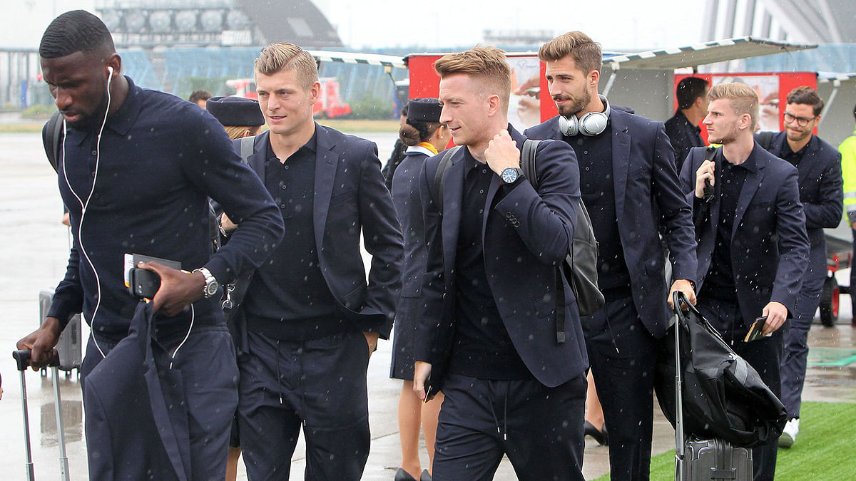 Germany`s defender Antonio Ruediger, Germany`s midfielder Toni Kroos, Germany`s forward Marco Reus, Germany`s goalkeeper Kevin Trapp and team mates of the German national football team are pictured on 12 June, 2018, at the airport in Frankfurt, during their departure for Moscow to the 2018 FIFA World Cup in Russia. Photo: AFP