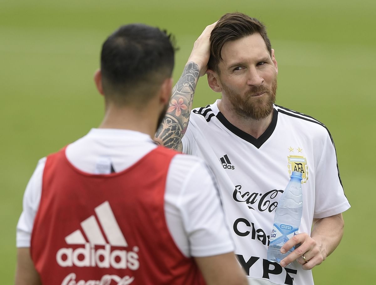 Argentina`s forward Lionel Messi (R) gestures during a training session at the team`s base camp in Bronnitsy on 13 June ahead of the Russia 2018 World Cup football tournament. Photo: AFP