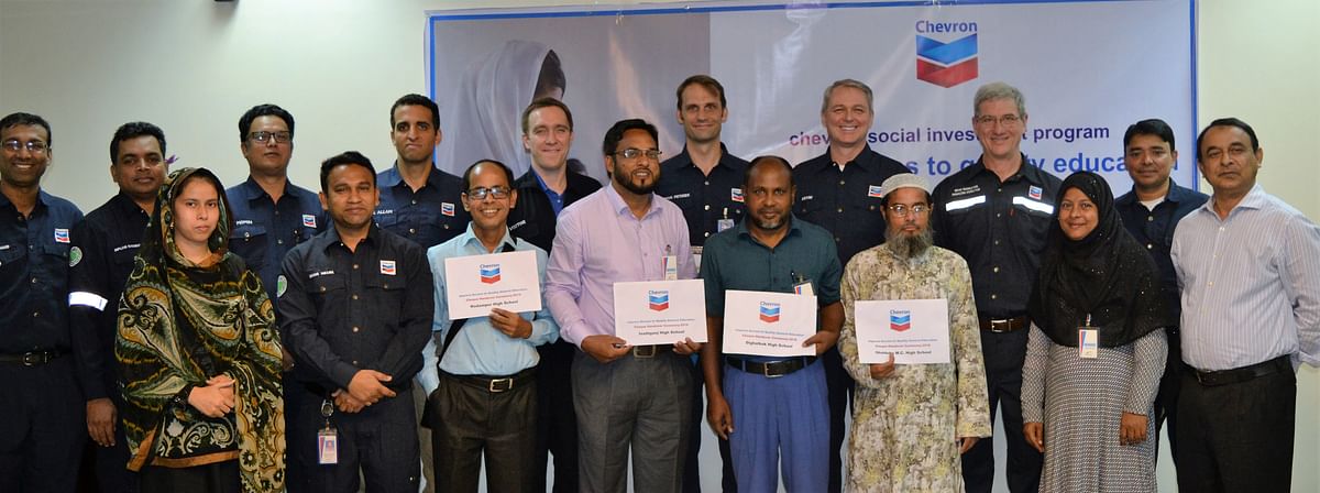 Seen in the photo are managing director for Chevron Asia-South, Brad Middleton; Chevron Bangladesh’s incoming and outgoing presidents, Neil Menzies and Kevin Lyon, respectively; operations director, Gary Orr; Bibiyana Gas plant superintendent, Bryan Mitisek, chairmen of school management committees; principals of some of the selected schools, teachers, and some Chevron employees.