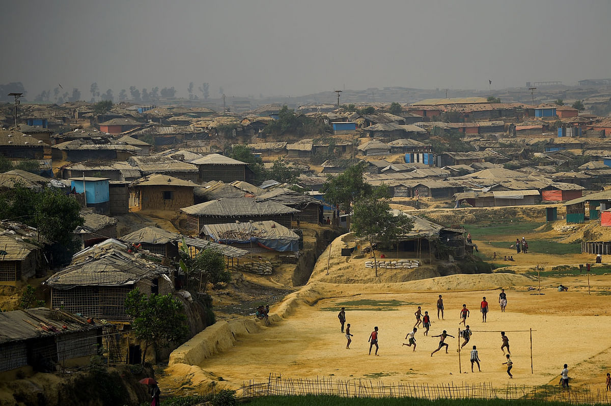 Rohingya refugees play football at Kutupalong refugee camp in Cox`s Bazaar, Bangladesh. A recent photo by Reuters