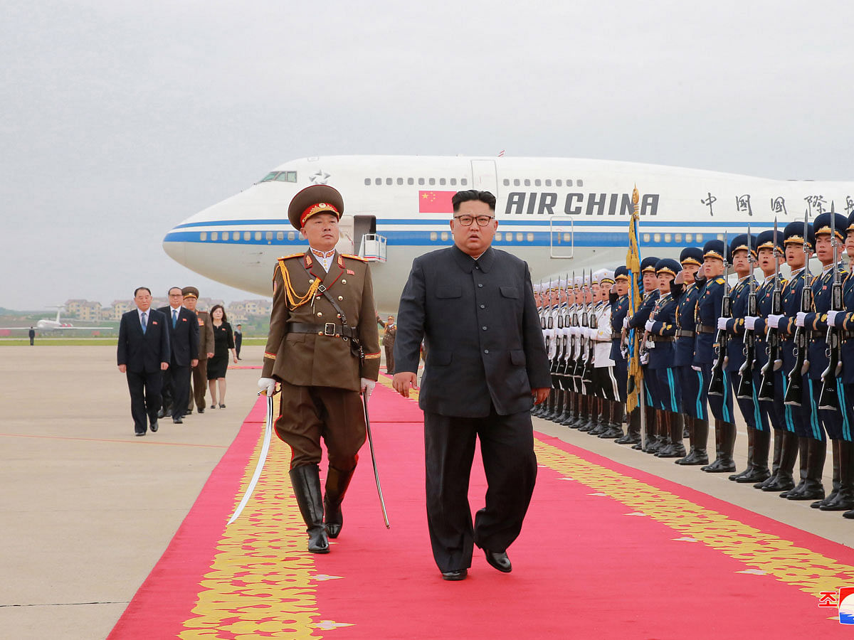 North Korean leader Kim Jong Un is seen returning to North Korea after the summit with US president Donald Trump, in this picture released on 13 June 2018. Photo: AFP