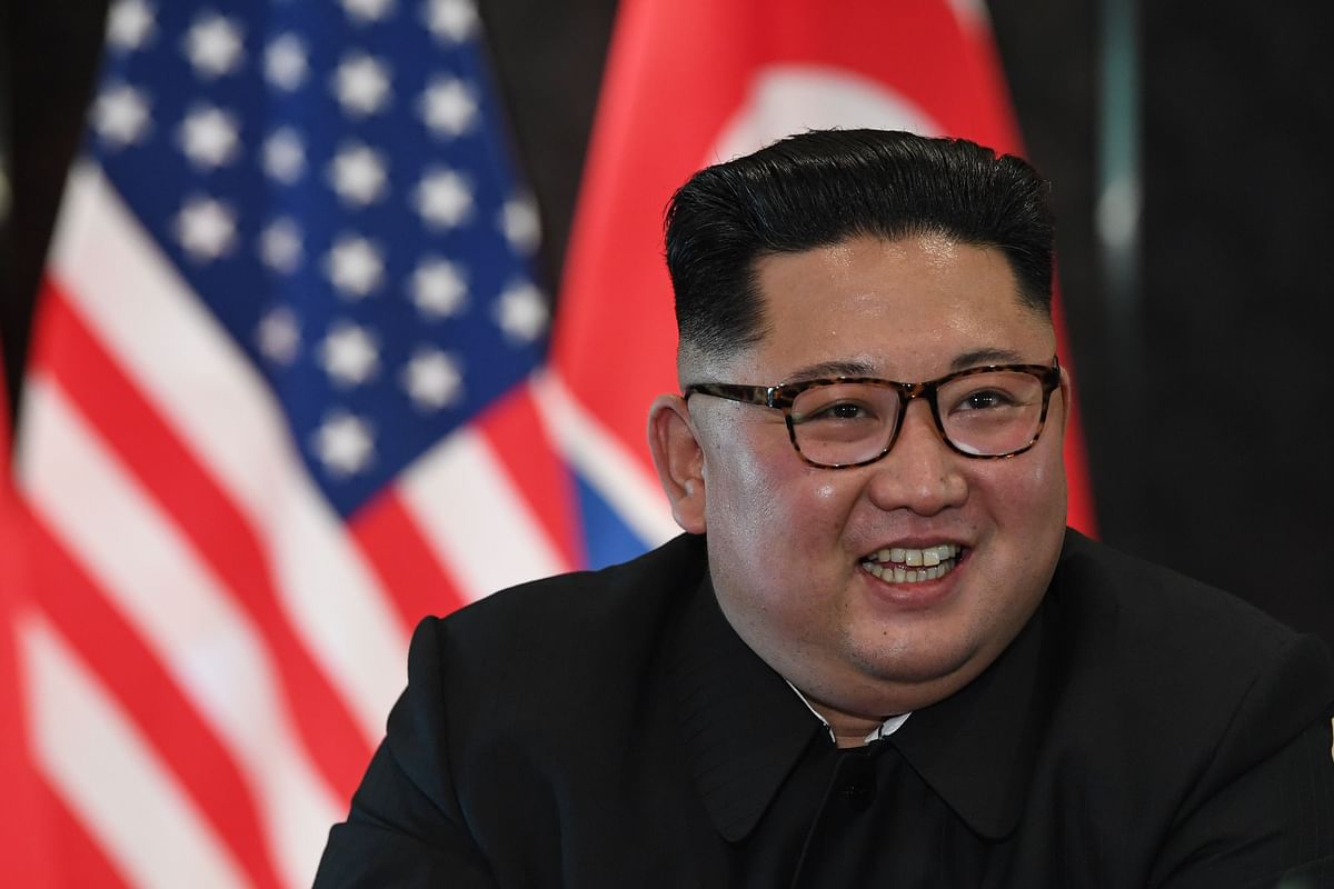 orth Korea`s leader Kim Jong Un reacts at a signing ceremony with US President Donald Trump (not pictured) during their historic US-North Korea summit, at the Capella Hotel on Sentosa island in Singapore on 12 June 2018. Photo: AFP