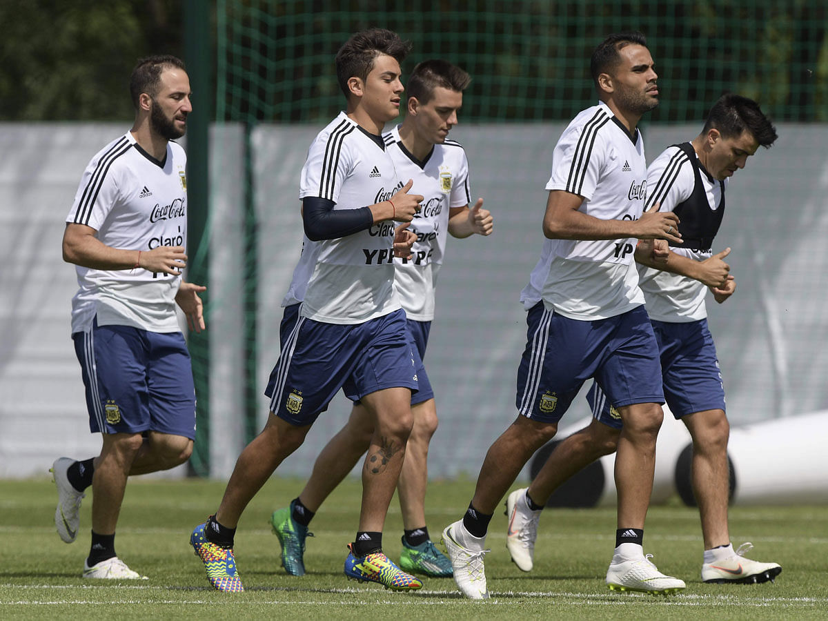 Argentina footballers (L-R) forward Gonzalo Higuain, forward Paulo Dybala, midfielder Giovani Lo Celso, midfielder Enzo Perez and defender Marcos Acuna jog during a training session at the team`s base camp in Bronnitsy, near Moscow, on June 12. AFP
