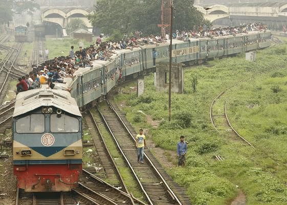 The people turn homewards this time every year. Many take risks on their journey home on the eve of Eid. The picture of an overcrowded train roof was captured by Sumon Yusuf from Kamalapur in Dhaka on 13 June.