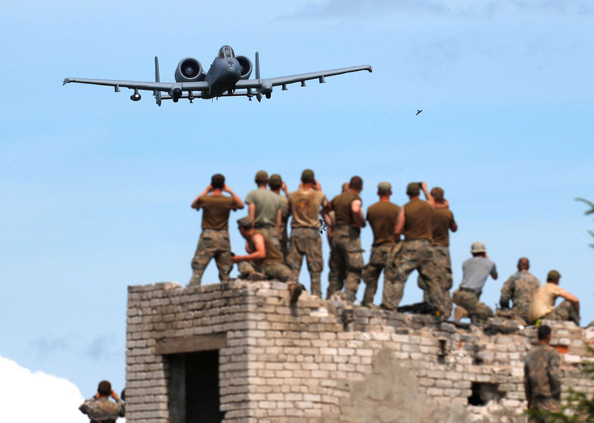 US Air Force A-10 aircraft takes part in the urban fighting drill during the NATO Saber Strike exercise in the Soviet-time former military town near Skrunda, Latvia on 13 June 2018. Photo: Reuters