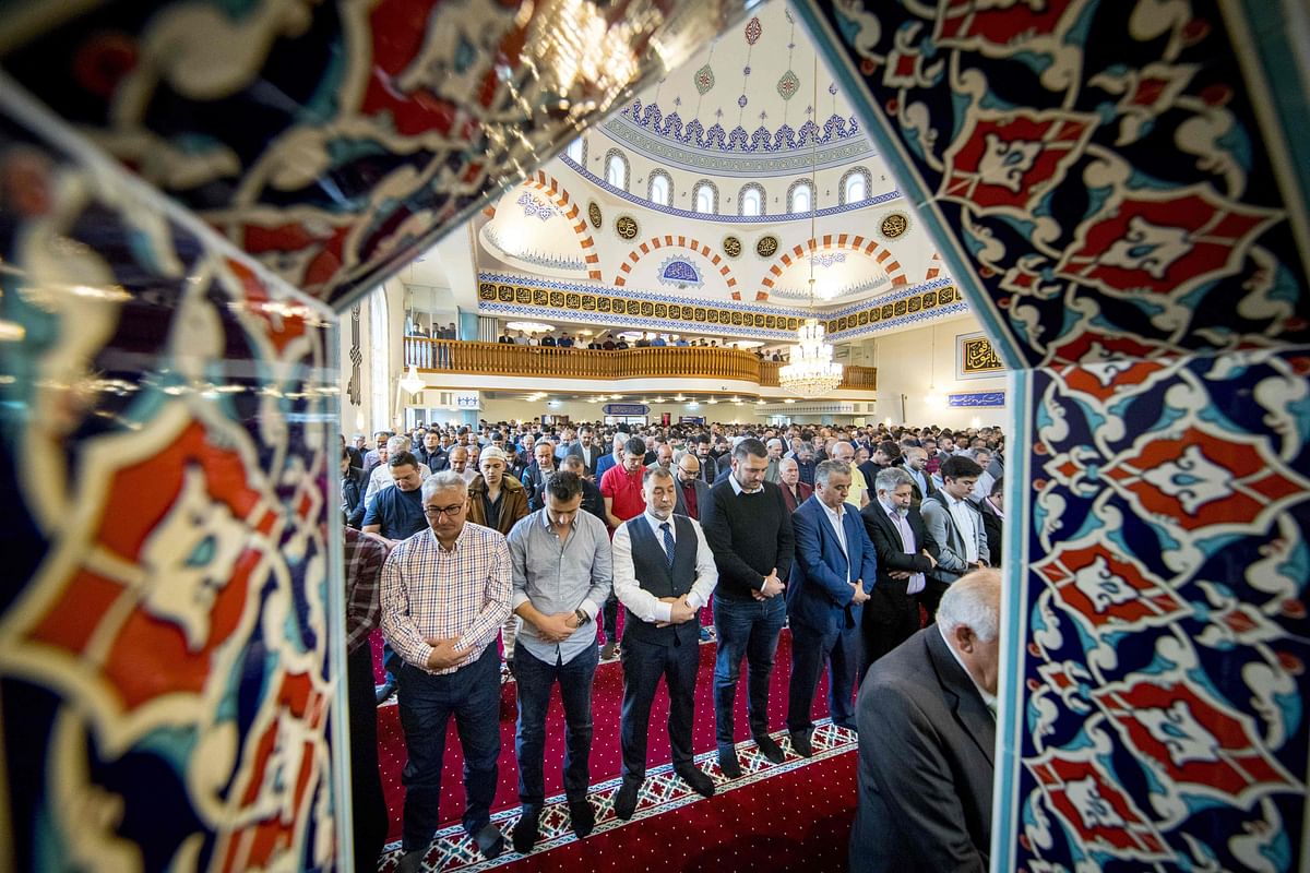 Muslims perform Eid al-Fitr prayer at the Mevlana mosque in Rotterdam. Photo:  AFP