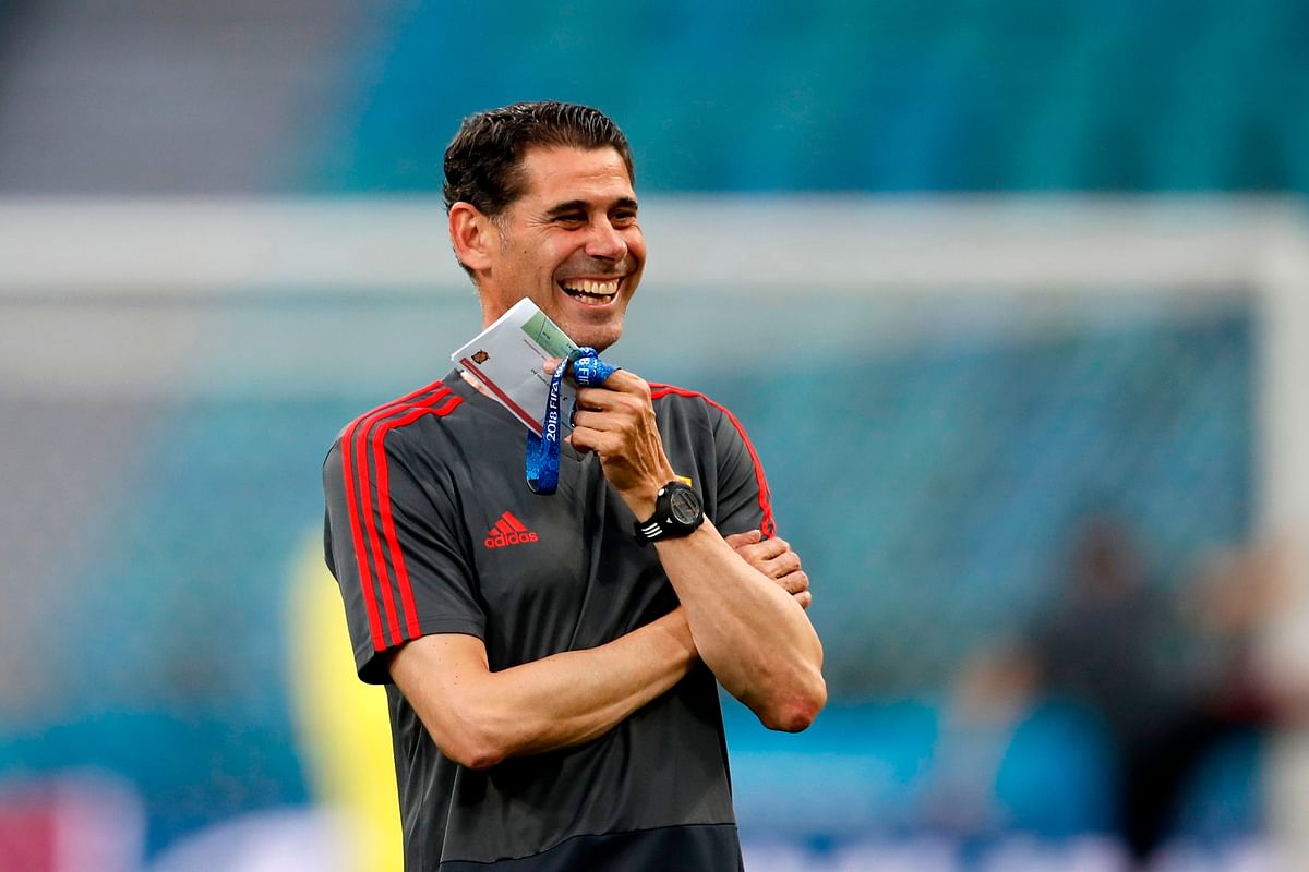 Spain coach Fernando Hierro smiles as he watches his team players during a training session at the Fisht Olympic Stadium in Sochi on June 14, 2018, on the eve of their 2018 World Cup Group B match against Portugal. AFP