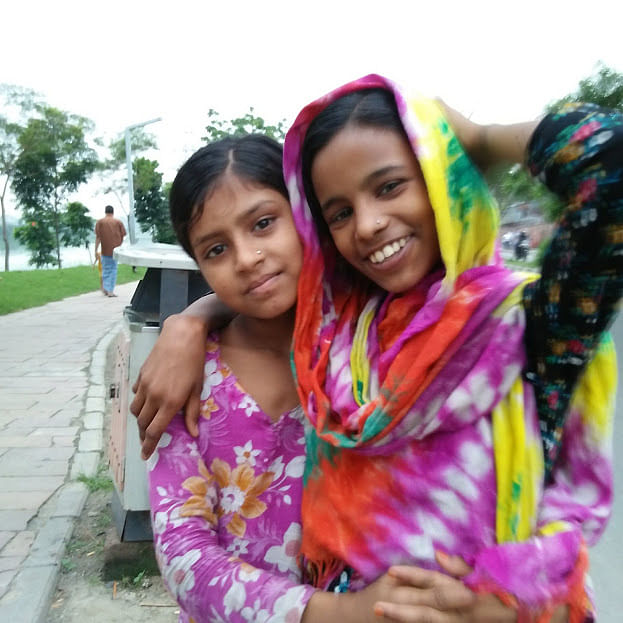 Tanjila, 9, (R) from Rampura in Dhaka wants to visit new places to celebrate Eid. The photo was taken from Hatirjheel area on 21 May 2018 by Nusrat Nowrin