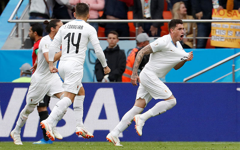 Uruguay`s Jose Gimenez celebrates scoring their first goal on 15 June 2018. Photo: Reuters