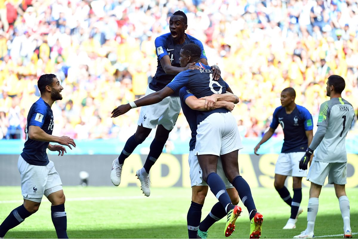 France midfielder Paul Pogba (6) celebrates with teammates after scoring their second goal during their Group C match against Australia at the Kazan Arena in Kazan on June 16, 2018. AFP