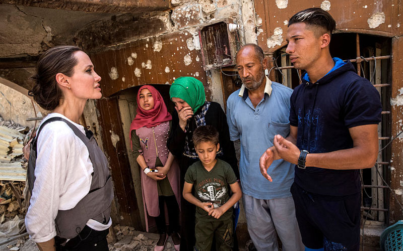 UNHCR Special Envoy Angelina Jolie meets with Mohamed and his family during a visit to the Old City in West Mosul, Iraq on 16 June. Photo: Reuters