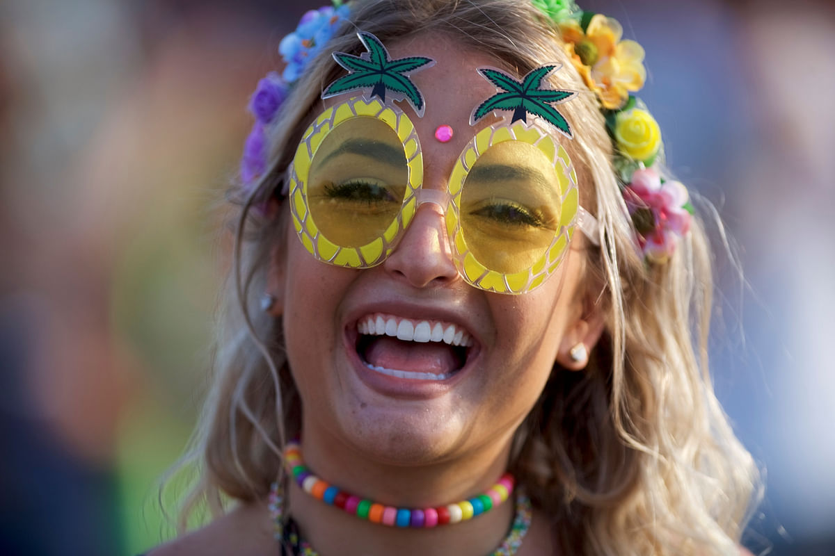 Sheli Siders, 22, dances while MGMT performs on the fourth and final day of the Firefly Music Festival in Dover, Delaware US on 17 June. Photo: Reuters
