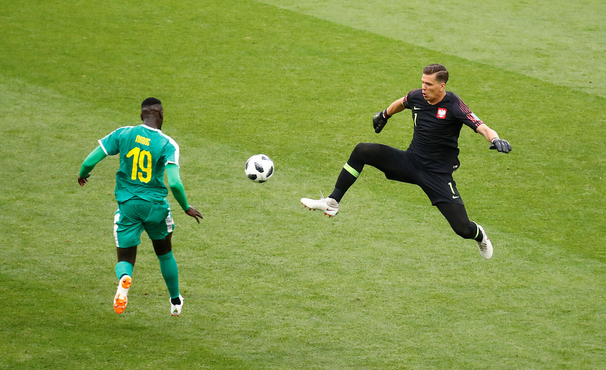 Senegal`s M`Baye Niang scores their second goal past Poland`s Wojciech Szczesny in Group H match in Spartak Stadium, Moscow, Russia on 19 June. Photo: Reuters