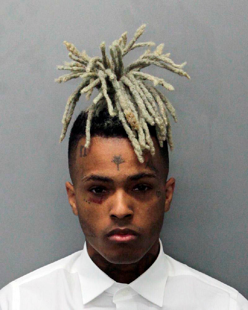 This 2017 arrest photo made available by the Miami Dade Dept. of Corrections shows Jahseh Onfroy, also known as the rapper XXXTentacion, under arrest. Onfroy was shot and killed on 18 June. Photo: AP