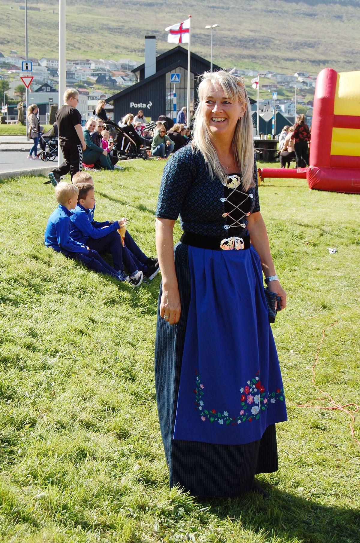A woman poses on 3 June 2018 in a traditional Faroese outfit during a festival in Klaksvík, on the island of Borooy, one of the Faroe Islands located between the North Atlantic Ocean and Norwegian Sea. Photo: AFP