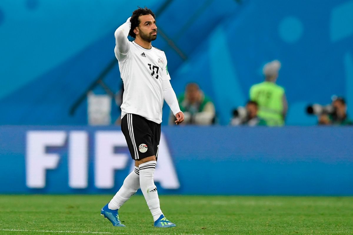 Egypt`s forward Mohamed Salah reacts after the final whistle of the Russia 2018 World Cup Group A football match between Russia and Egypt at the Saint Petersburg Stadium in Saint Petersburg on 19 June 2018. Photo: AFP
