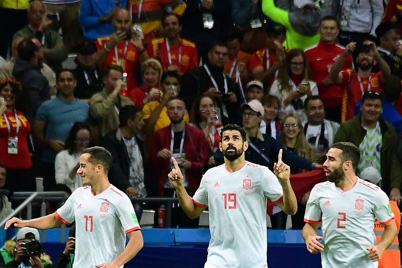 Spain`s forward Diego Costa (M) celebrates his goal during the Russia 2018 World Cup Group B football match between Iran and Spain at the Kazan Arena in Kazan on 20 June 2018. Photo: AFP