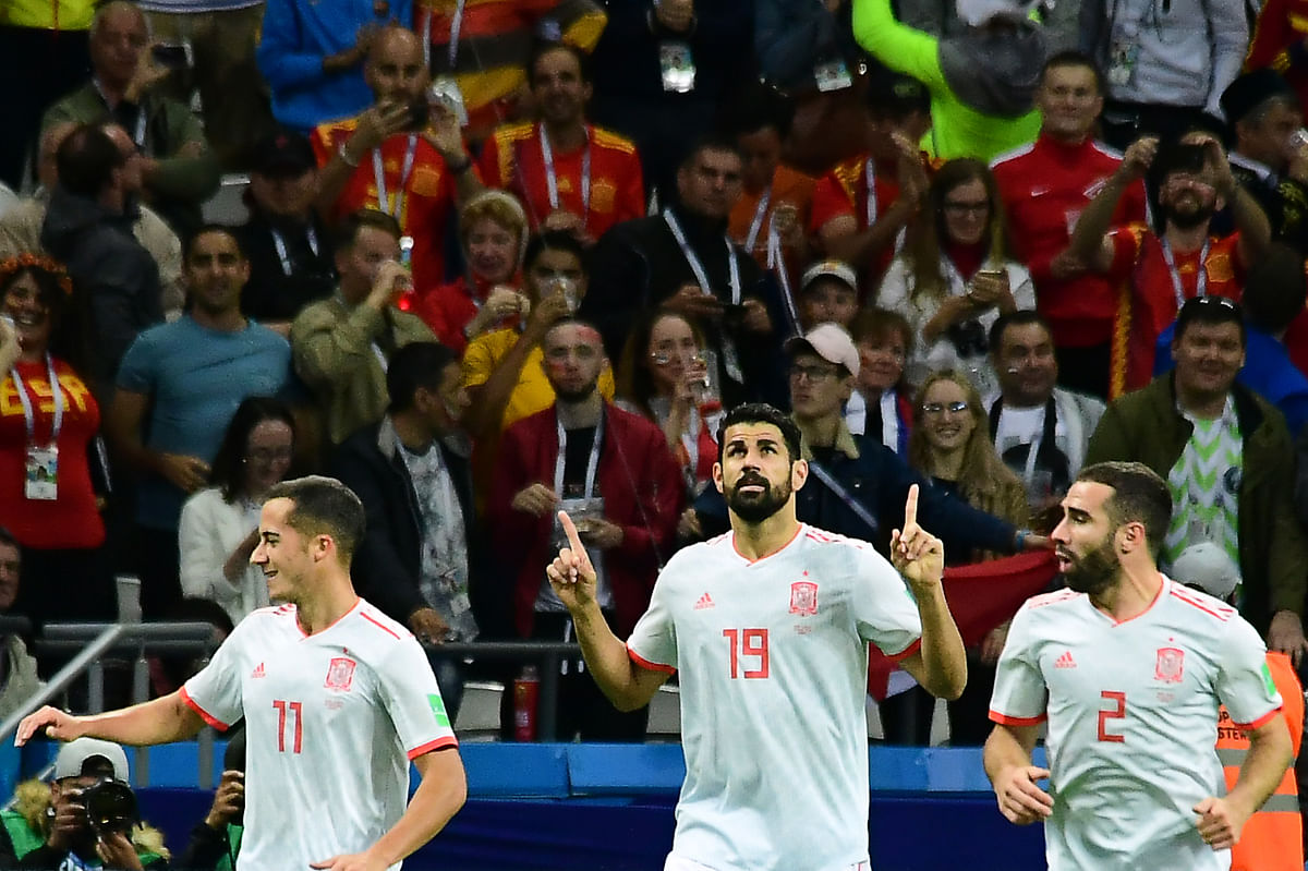 Spain`s forward Diego Costa (M) celebrates his goal during the Russia 2018 World Cup Group B football match between Iran and Spain at the Kazan Arena in Kazan on 20 June 2018. Photo: AFP
