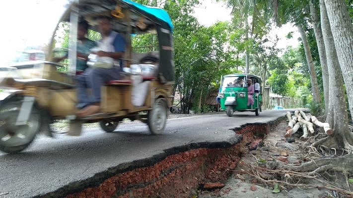 The floodwater of Bhairab river has damaged the old Rupsa-Bagerhat road in Bagerhat Sadar, Bagerhat. Photo: Injammul Haque